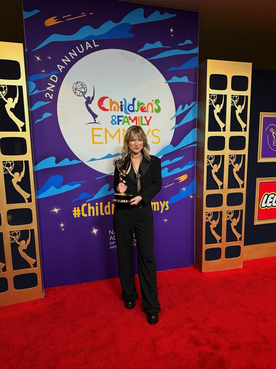 Heather Laura Gray at the Emmy Awards press wall